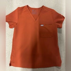 FIGS burnt orange Scrub Top
